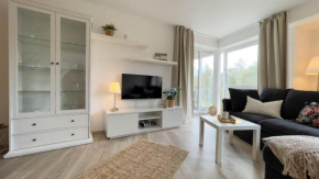 Гостиница Strandhaus-Nordseebrandung-Fewo-B1-3  Куксхафен